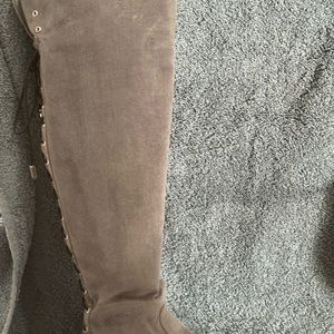 Just under knee high boots.